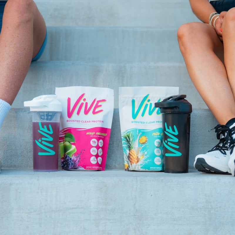 Vive protein packaging and shaker bottle on a step